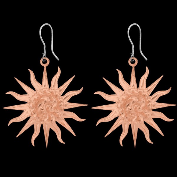 The bright and beautiful Orange Blossom Earrings are the perfect summertime western accessory.  Featuring a gorgeous sunburst shape in a hand engraved copper base.